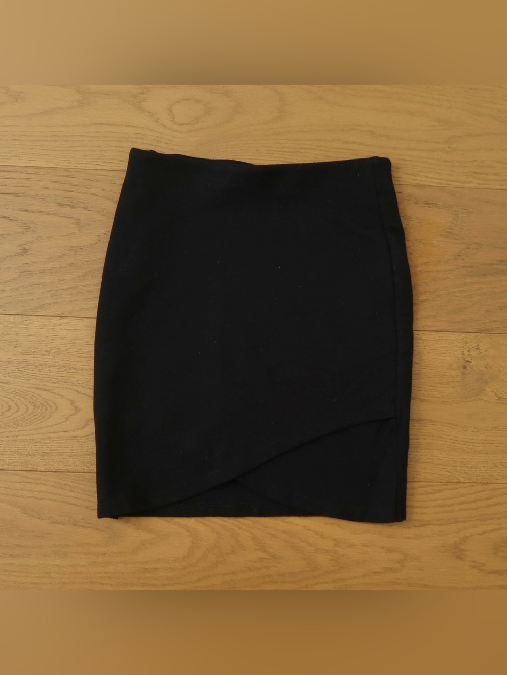 Talula Black Asymmetrical Pencil Mini Skirt